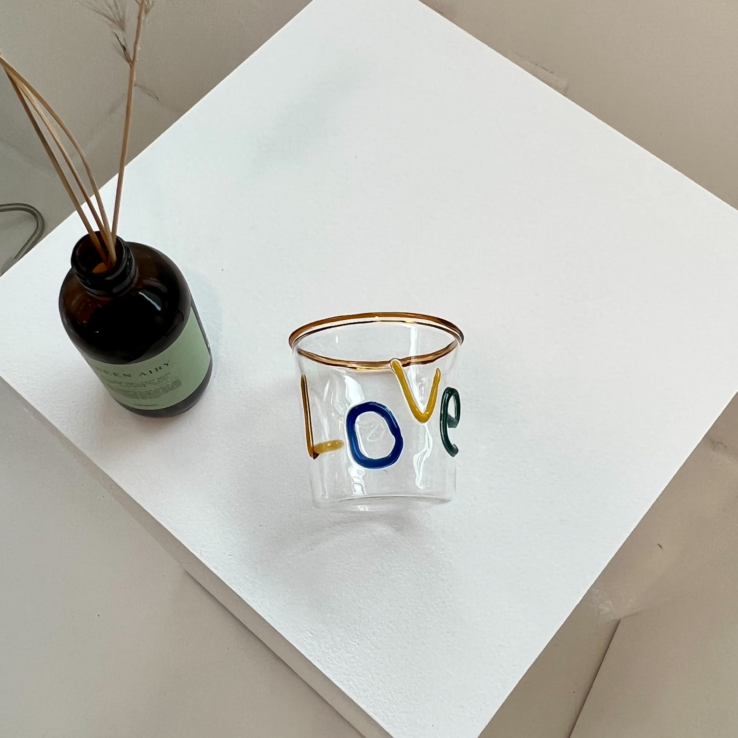 LOVE logo glass